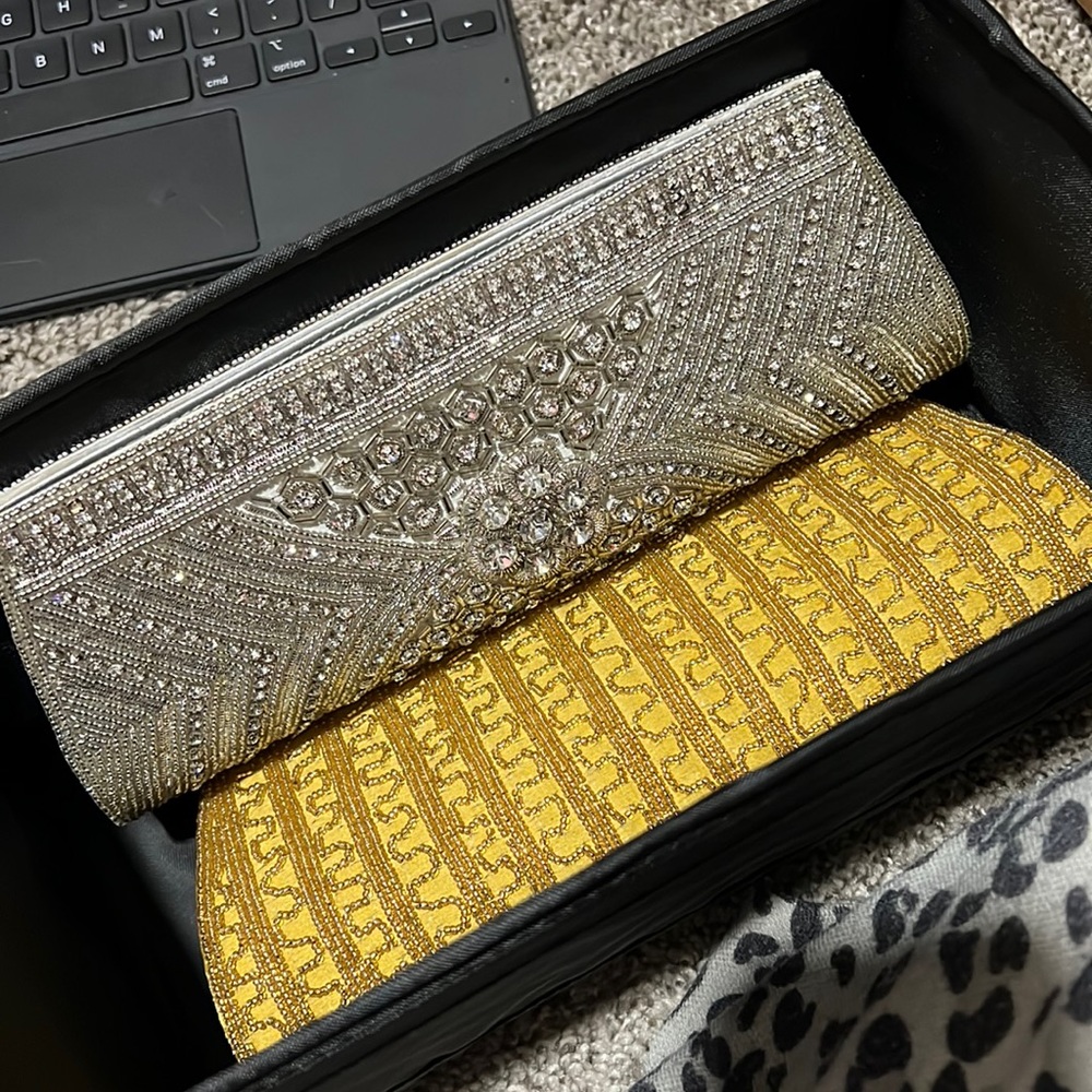 Silver color unused clutch/purse.